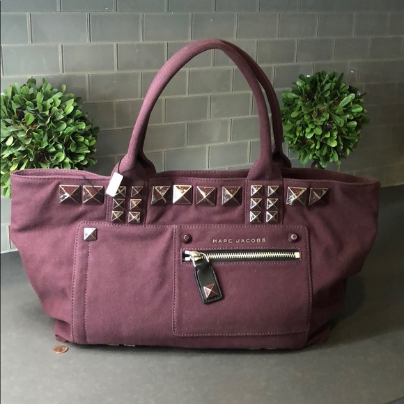Marc Jacobs Handbags - ♥️ MARC JACOBS BURGUNDY CANVAS TOTE W STUDS NWT.